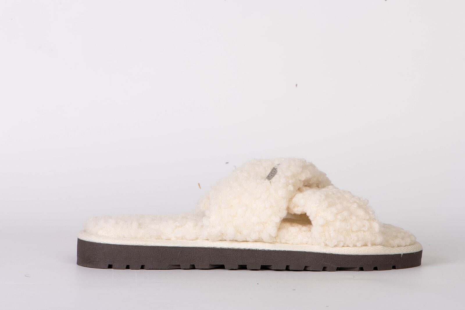 White criss cross on sale slippers